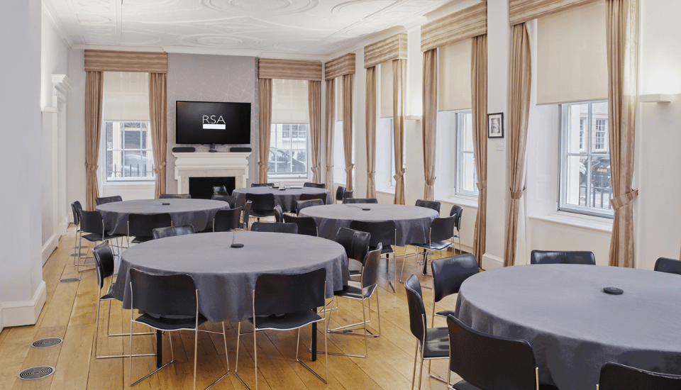 Image of the Tavern Room with furniture arranged in cabaret style.