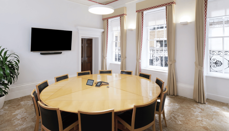 Image of the William Shipley Room with the furniture arranged in a board room style.