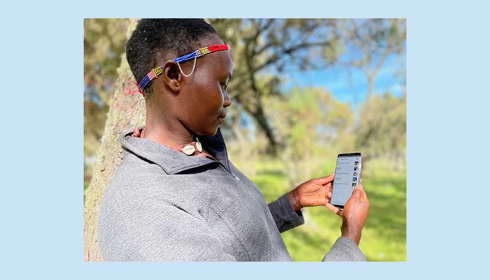 Image of Leah Kintai, one of the Ogiek community mappers demonstrates Mapeo on Mount Elgon, Kenya Reserve.