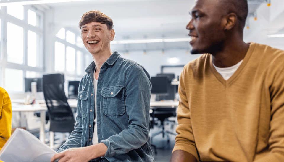 Workmates smiling.