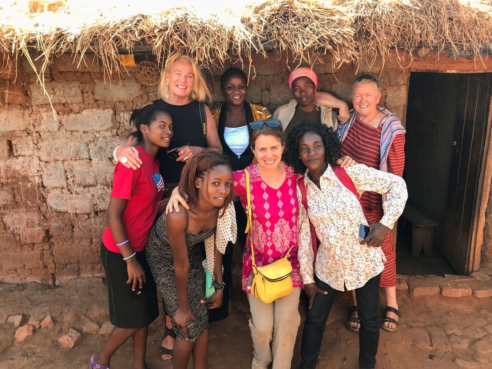 Lauren Anders Brown and Janie Hampton with women in Malawi